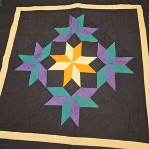 Handmade Quilt with Star Pattern in Black, Purple, and Teal